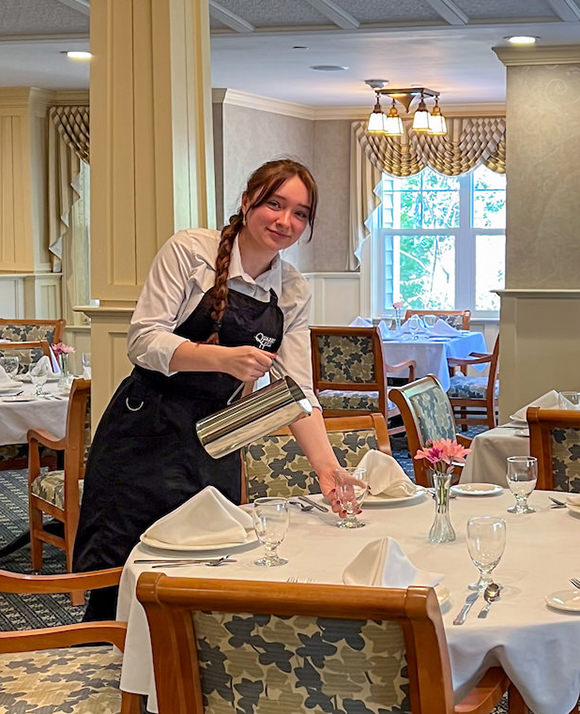 Kamryn pouring water